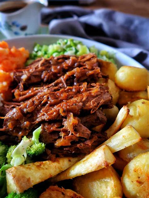 slow-cooker-beef-brisket-with-rich-onion-gravy-the image
