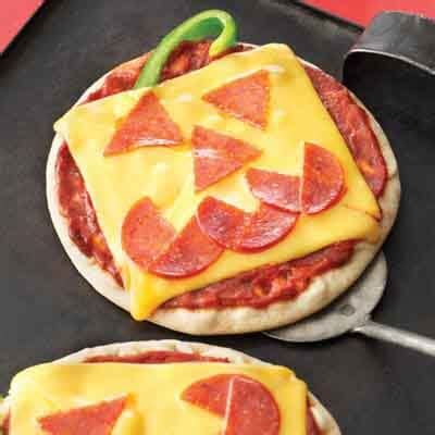 jack-o-lantern-pizzas-recipe-land-olakes image