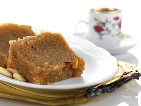 greek-halvasemolina-pudding-with-nuts-and-raisins image