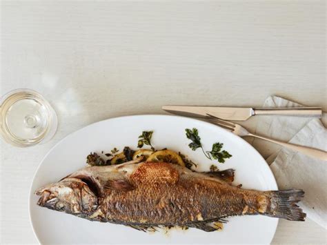 herb-stuffed-whole-fish-recipe-amanda-freitag-food image