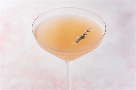 lavender-lemon-drop-martini-recipe-the-spruce-eats image