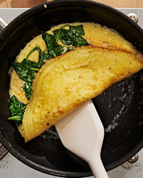spinach-omelet-recipe-fluffy-with-parmesan-kitchn image