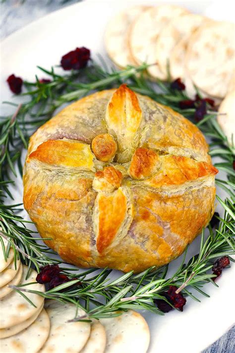 baked-brie-en-crote-with-cranberry-sauce image