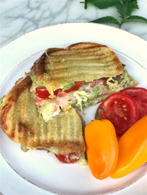 grilled-pesto-ham-and-provolone-sandwiches-rachel image