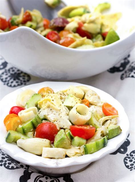 hearts-of-palm-salad-with-artichoke-hearts-cucumber-and-avocado image