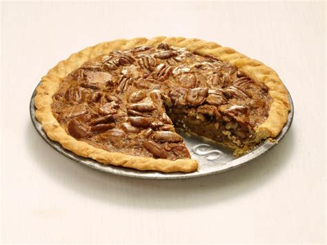 pecan-pie-with-spiced-rum-recipe-food-network image