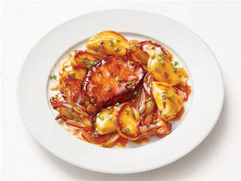 pork-chops-with-glazed-apples-and-pierogi-food image