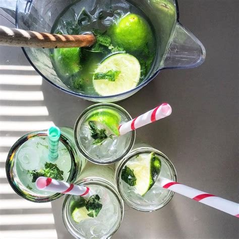 mojitos-by-the-pitcher-allrecipes image