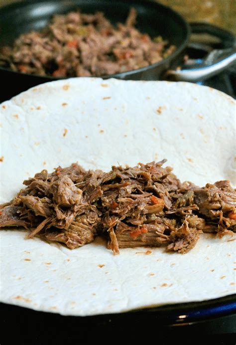 air-fryer-shredded-beef-chimichanga-recipe-the-foodie image