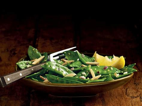 crunchy-snow-peas-with-toasted-almonds-recipe-food image