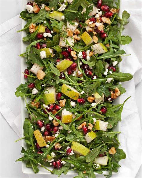 pear-gorgonzola-salad-with-pomegranate-nuts image