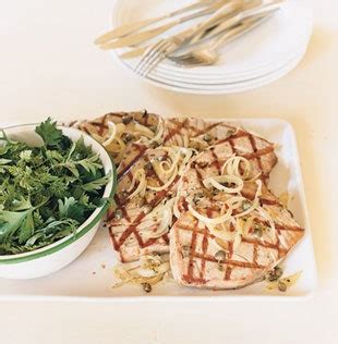 caper-rosemary-tuna-with-herb-salad-recipe-bon-apptit image