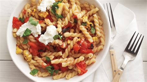 grilled-tomato-and-corn-pasta-recipe-martha-stewart image