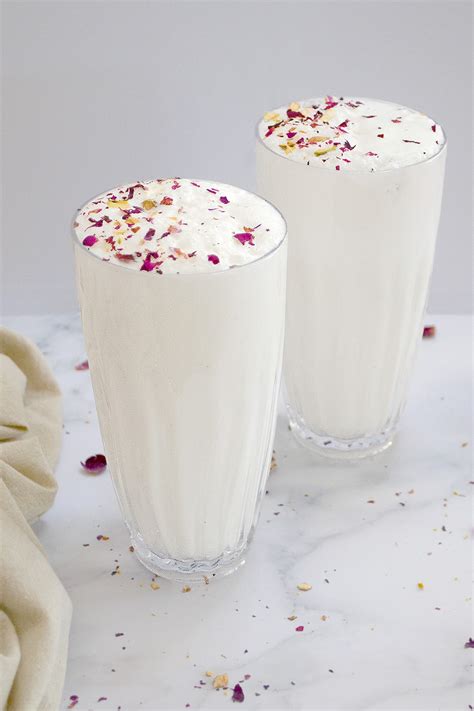 the-best-sweet-lassi-indian-yogurt-drink-piping-pot image