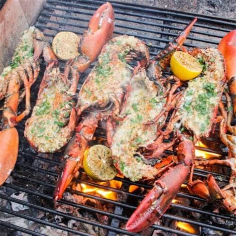 grilled-lobster-with-garlic-butter-over-the-fire-cooking image