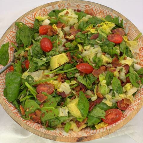 wilted-spinach-salad-with-bacon-and-avocado image