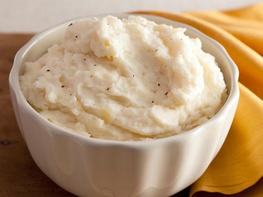 creamy-garlic-mashed-potatoes-recipe-alton-brown image