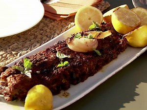 smoked-pork-ribs-recipe-michael-symon-food-network image